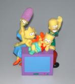 The Simpson family around TV