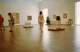 Nude visiting an exhibition